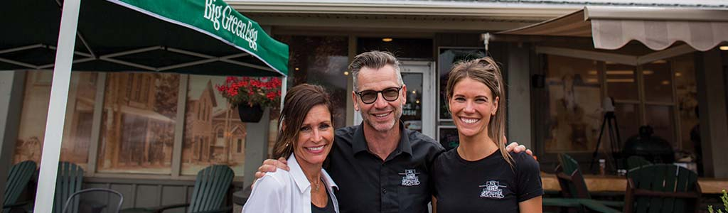 Bj's Country Market owners in front of their business