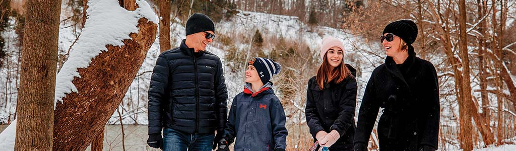 Family walking in the snow 